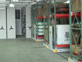 Mobilized compact racks in warehouse