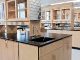 laboratory casework and cabinetry with drying rack and sink