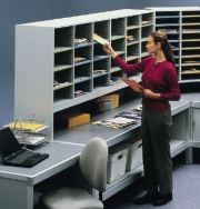 Woman Sorting Mail in Mail Room Sorter Furniture