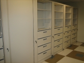 Empty Rotary Storage Cabinet with Drawers and Shelving